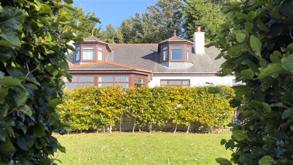 A view of Cowden Farmhouse from the front lawn